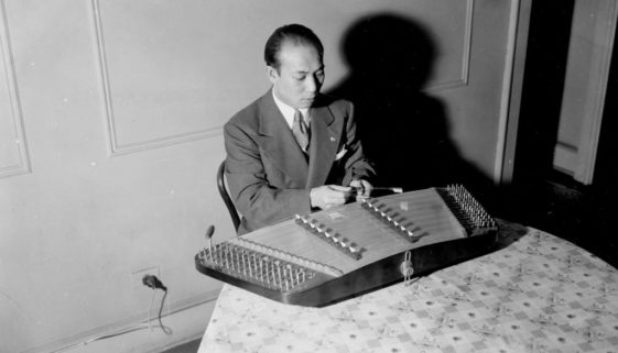 Man Playing a Chinese Harp