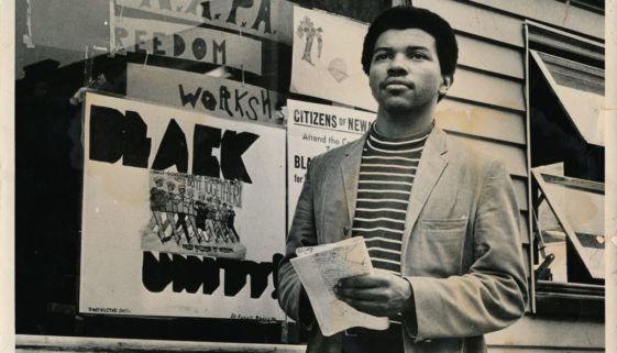 Photo of Junius Williams in front of NAPA Office